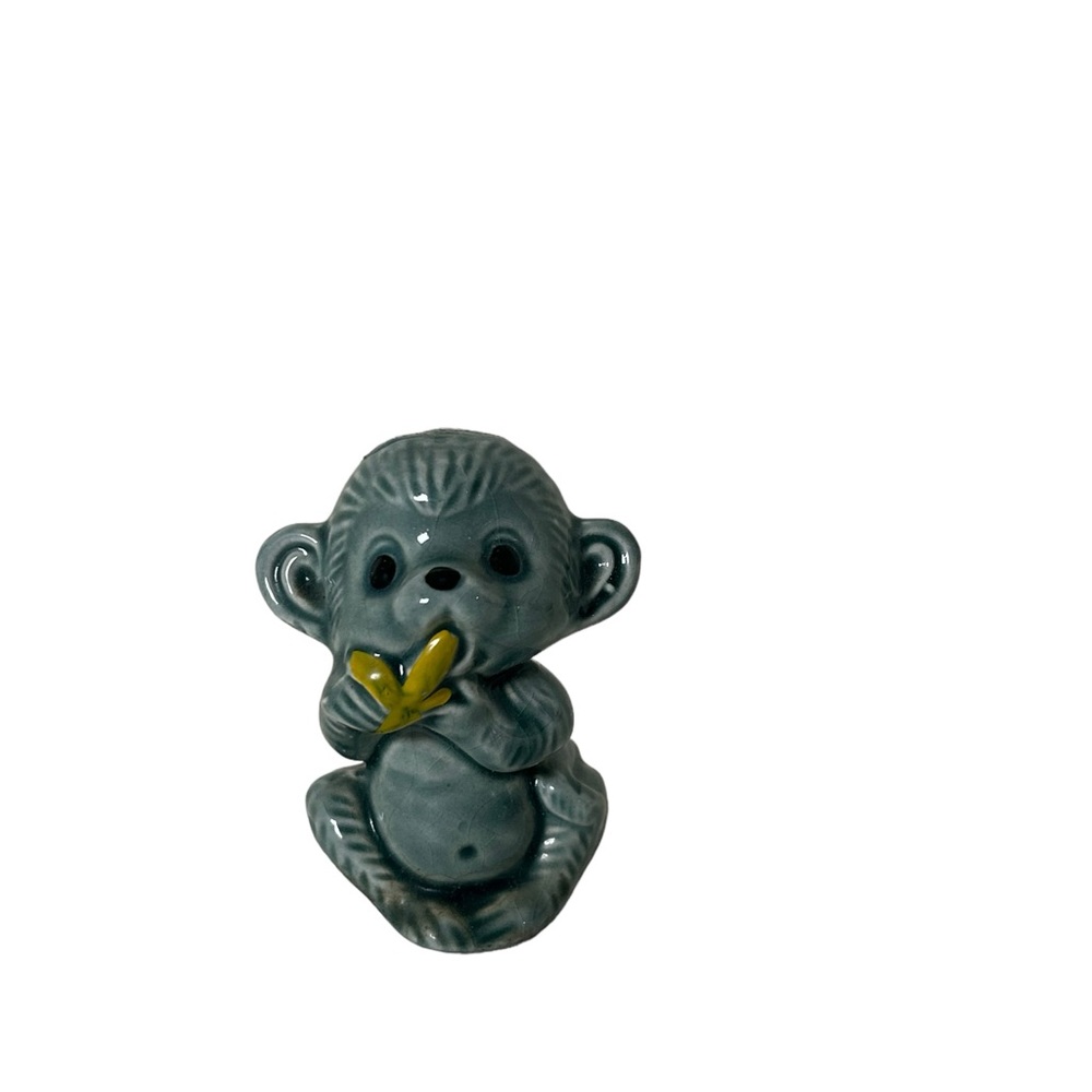 VINTAGE NORLEANS BLUE MONKEY EATING BANANA FIGURINE